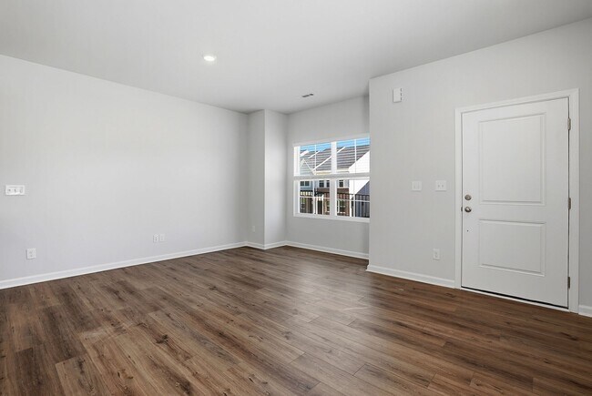 Building Photo - BRAND NEW TOWNHOME-9 FOOT CEILINGS-TWO CAR GARAGE-POOL COMMUNITY