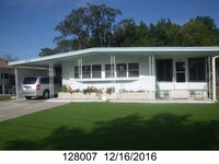 Building Photo - 2 BEDROOM 2 BATHROOM ON THE GOLF COURSE