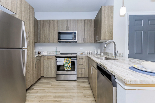 Building Photo - Step Into Sophistication in Every Square Foot