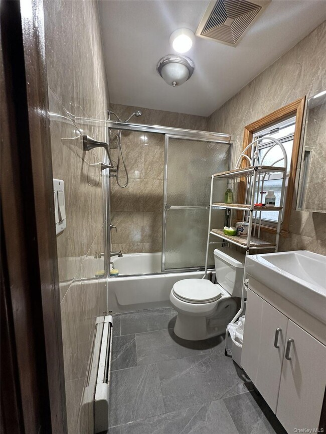 Building Photo - 168-04 35th Ave