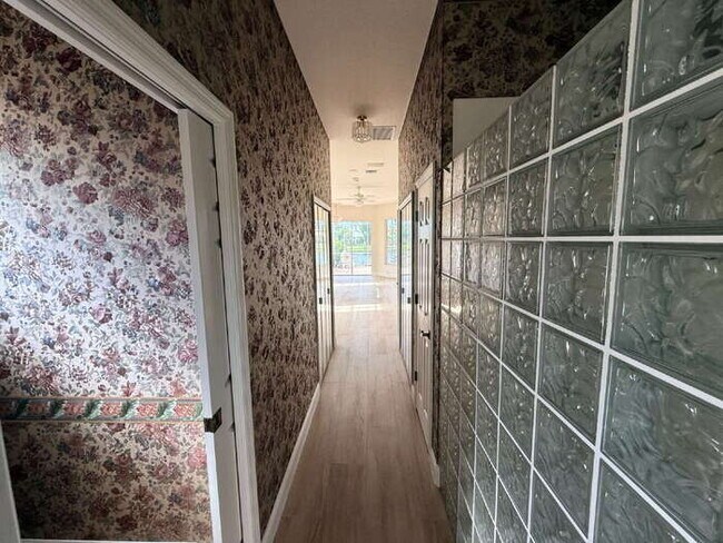 Building Photo - Lakefront 3 bedroom in gated Hidden Lakes Club