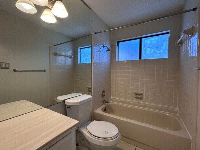 Building Photo - Charming 2BR Condo with Vaulted Ceilings, Fireplace & Pool Access