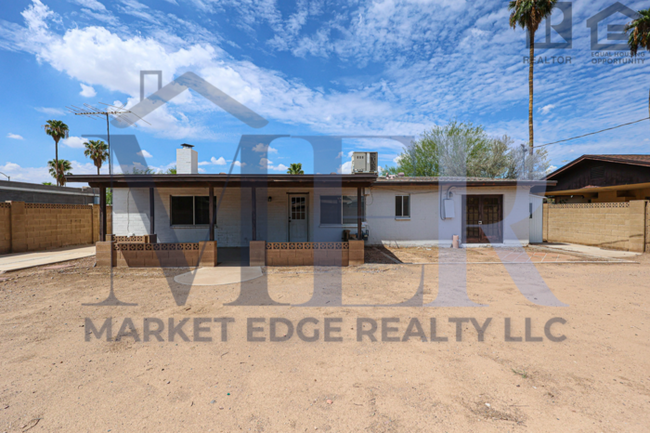 Building Photo - 3bed/1.5bath House at 35th Ave. & Cactus! ...