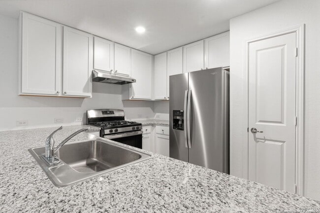 Building Photo - This beautiful single-story home has 4 bedrooms, 2 baths, vinyl flooring throughout, an open floo...