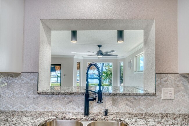Building Photo - Treasure Island Three Bedroom, Two Bath Furnished Single Family Home on the water.