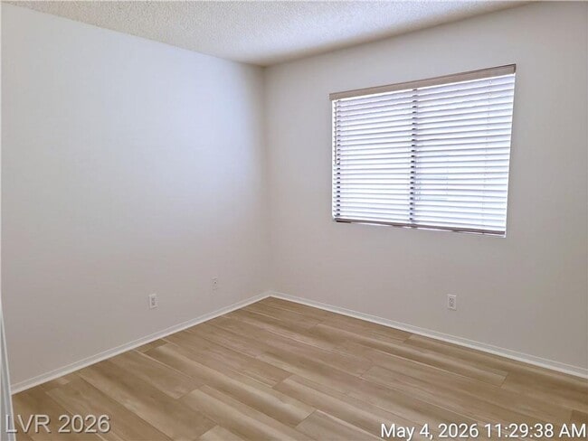 Building Photo - The Lakes Home with No Carpet, Fireplace & Covered Patio