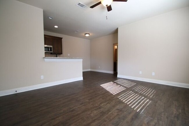 Building Photo - Beautifully Upgraded 3/2 Duplex w/ Garage & Fenced Yard | Off Camp Bowie!