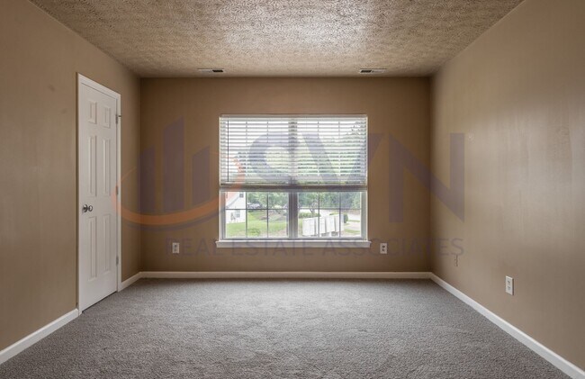 Building Photo - Cozy 2BR, 1.5BA Townhome in Durham Amberlynn Valley Neighborhood