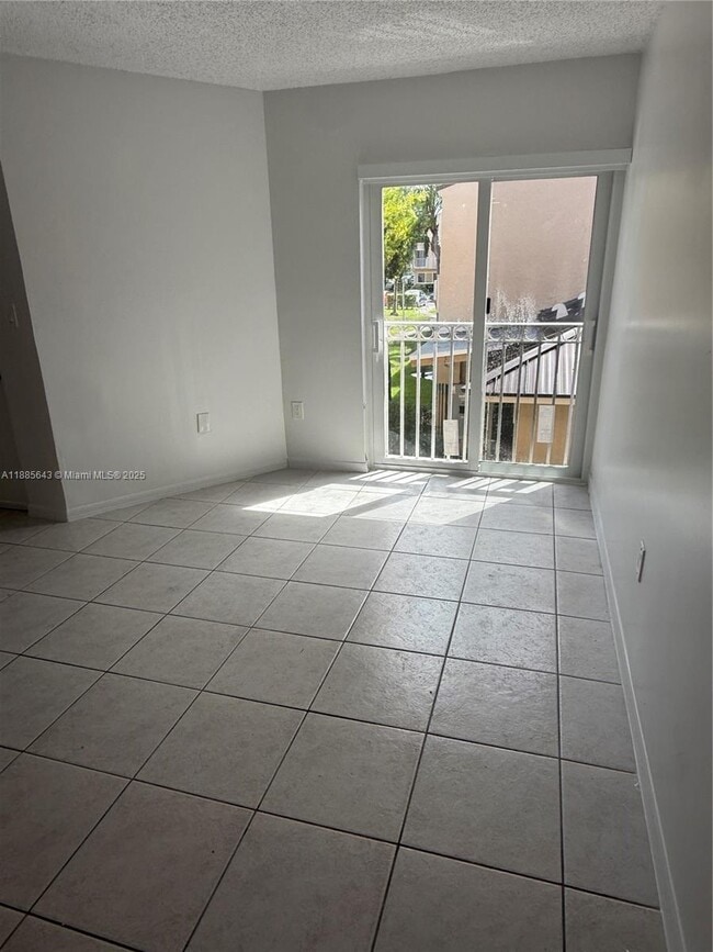 Building Photo - 8585 NW 6th Ln