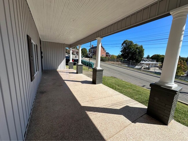 Front porch of building - 356 Moore St