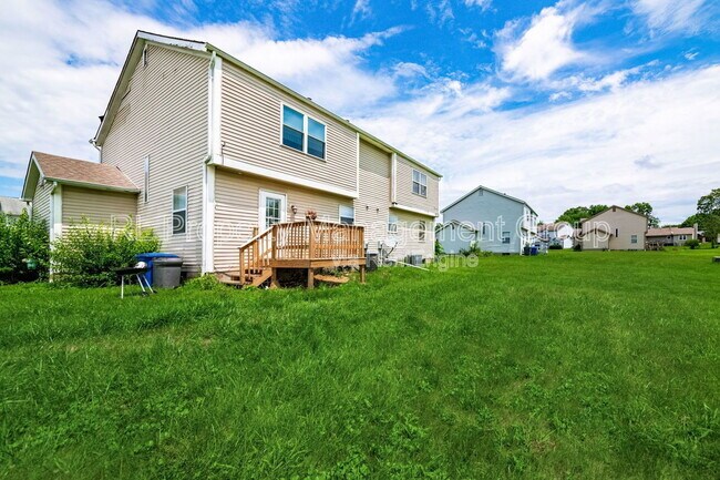 Building Photo - 7179 Feather Ct