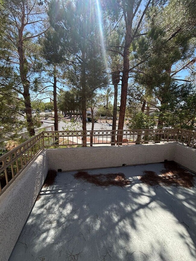 Building Photo - Gated Green Valley Ranch Townhome | 2 Bed | 2.5 Bath | 2-Car Garage