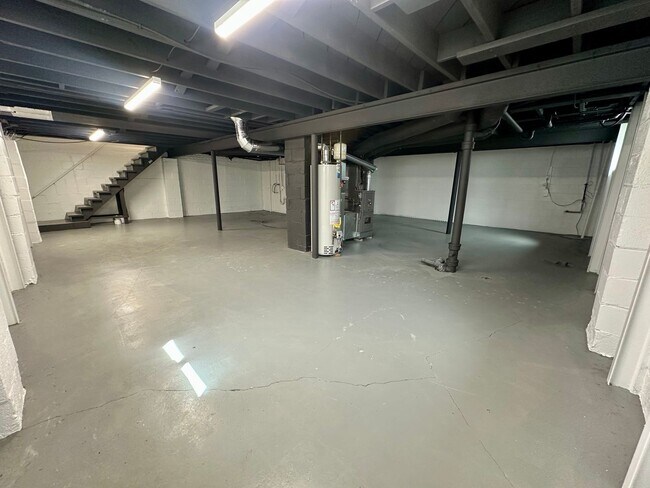 Building Photo - {5221} Updated Prairie Village Ranch + Fenced Yard + One Car Garage