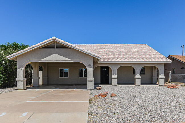 Building Photo - 6524 E Arbor Ave