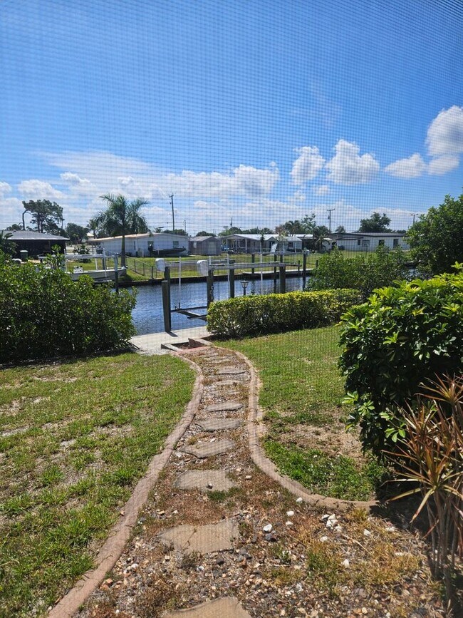 Building Photo - Port Charlotte Waterfront salt water pool annual rental