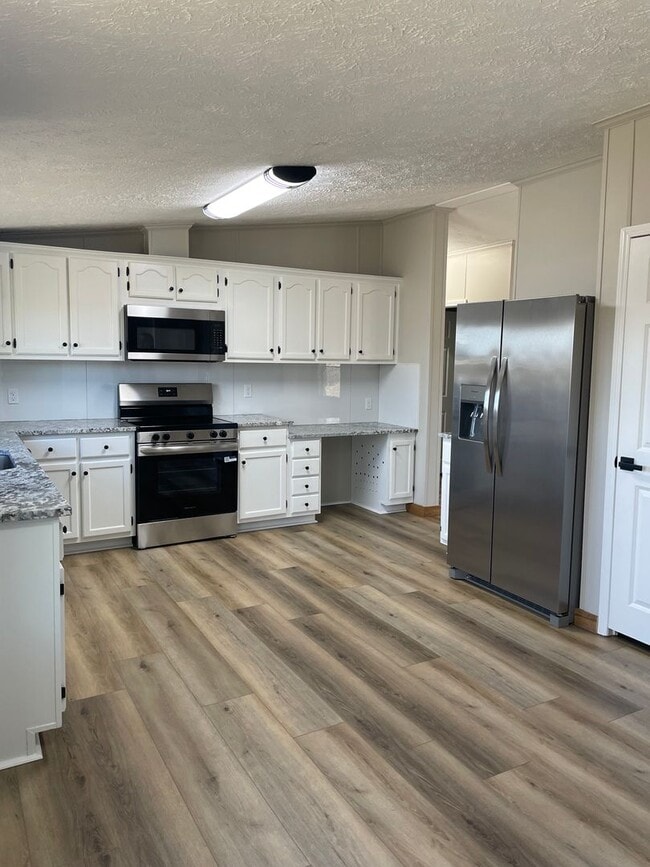 Building Photo - Peaceful Country Living on 1.4 Acres Beautifully Remodeled 3 Bed / 2 Bath Home on Ficklin Road