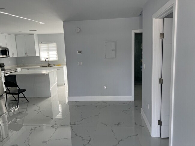 Building Photo - "Charming 2-Bed Retreat Waterfront W/Pool ...