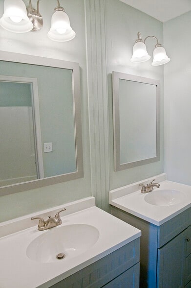 Master bathroom double sinks. Toilet and shower/tub in a separate room. - 409 Erskine St