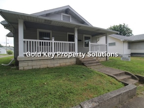 Building Photo - Attractive 2 BR 1 BA House with 2-Car Garage and Covered Porch (NO SECTION 8)