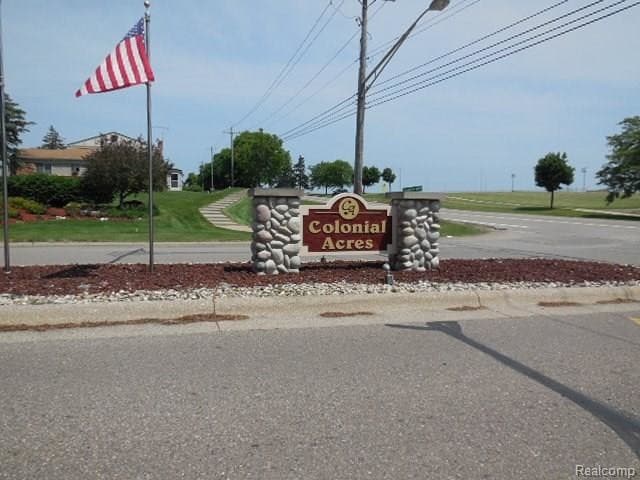 Colonial Acres sign - 61035 11 Mile Rd