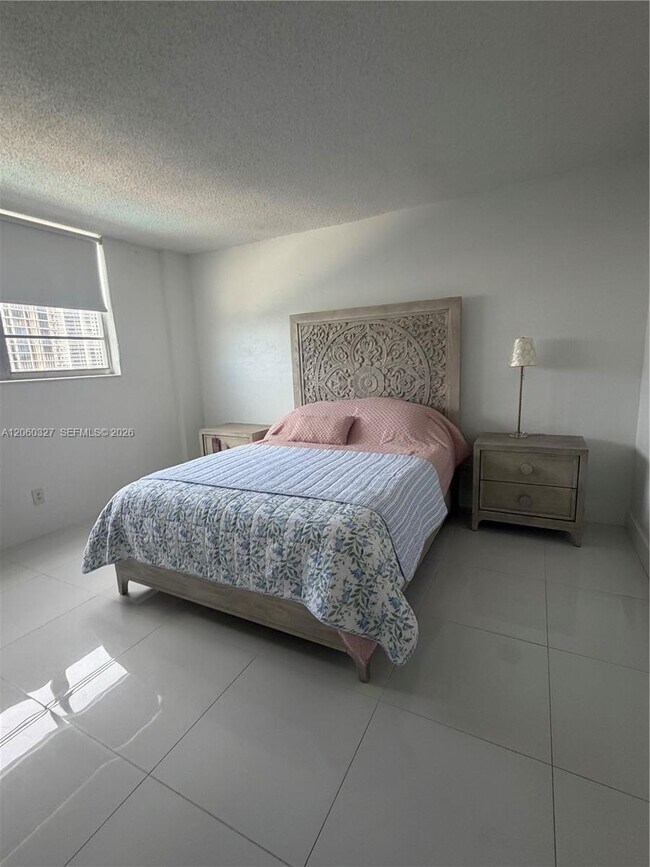 Building Photo - 19390 Collins Ave