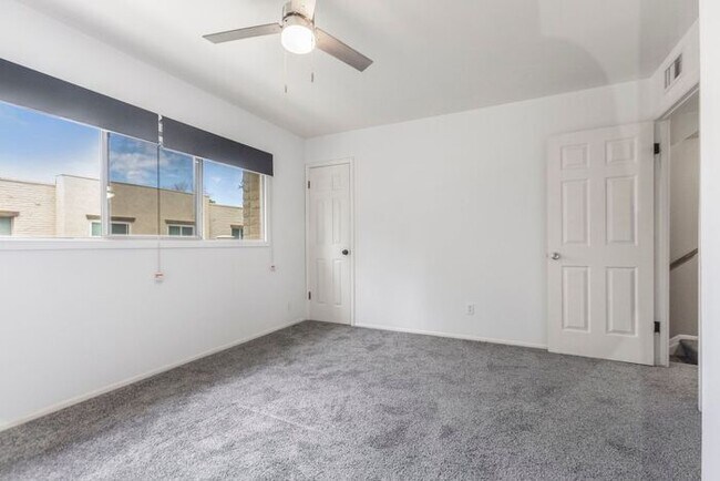 Building Photo - Discover this charming two-story townhome