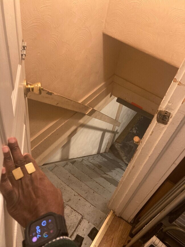 Low ceiling to the basement from the kitchen - 5004 Euclid Ave