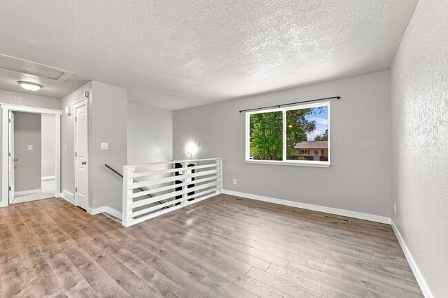 Building Photo - $2,095.95, 4 bed, 2 bath, located in Colorado Springs with a fenced-in backyard.