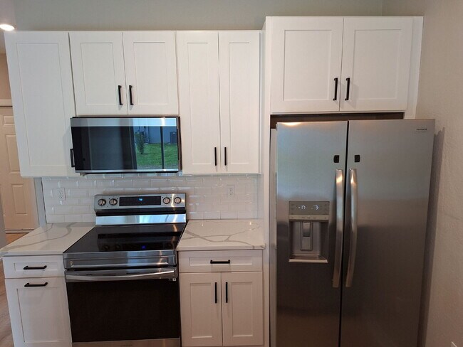 Building Photo - Available with ZERO DEPOSIT MOVE-IN!