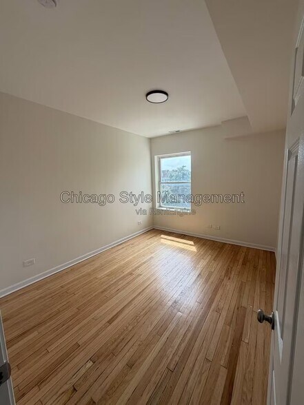 Building Photo - 7831 S Colfax Ave