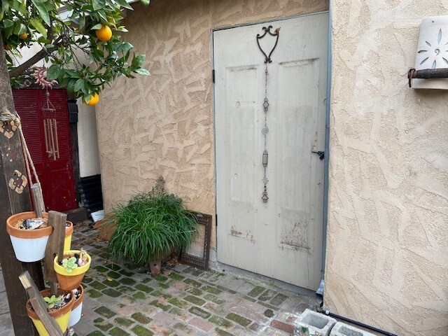 locked door to shared storage room - 2258 Overland Ave