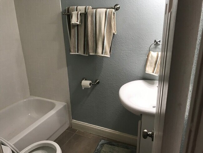 Building Photo - ** Move in Special $500 off your first months rent** WONDERFUL 4 Bedroom/3 Bathroom Home in the M...