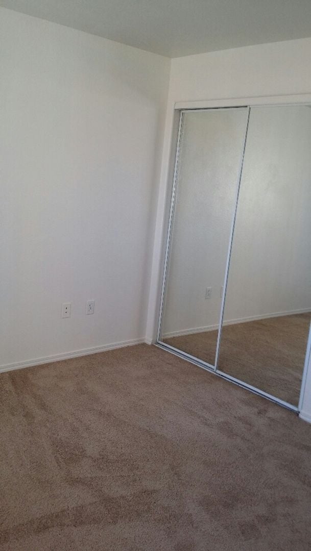 Building Photo - We Pay Referrals - A Move-In Ready Condo!