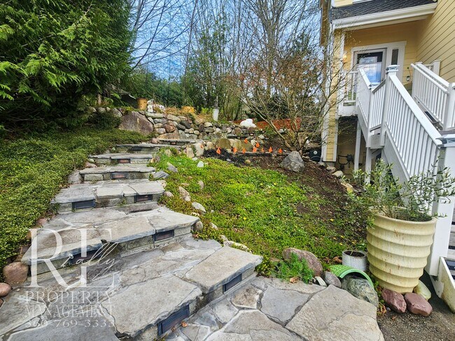 Building Photo - Light-Filled View Home with Vaulted Ceilings & Warm Wood Finishes