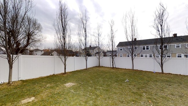 Building Photo - Spacious Revere home with large fenced yar...