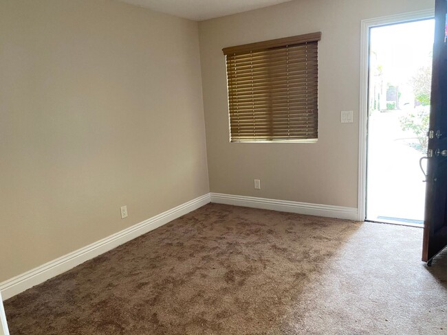 Building Photo - AFFORDABLE 1st Floor Condo & patio yard!
