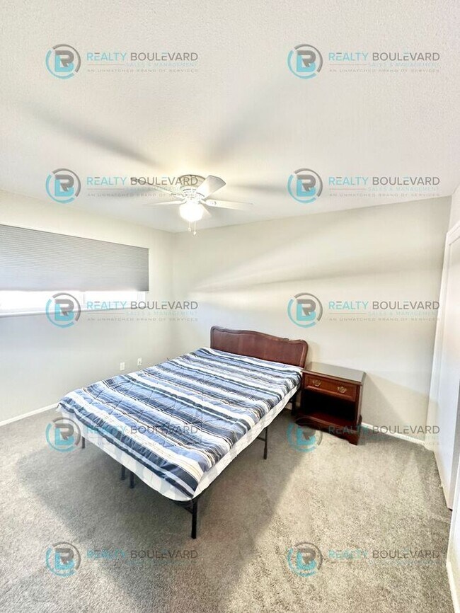 Building Photo - 2-bed, 2-bath, 2-story townhome with pool and park like setting outside the front door.