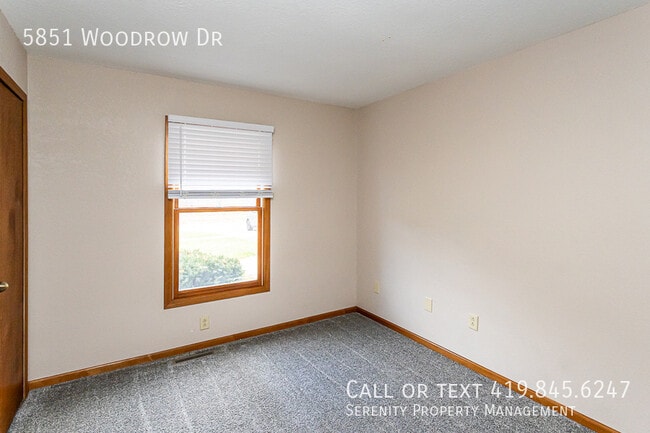 Building Photo - 5851 Woodrow Dr