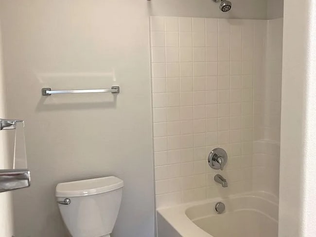 Building Photo - this ranch-style home features 4 bedrooms and 2 bathrooms.