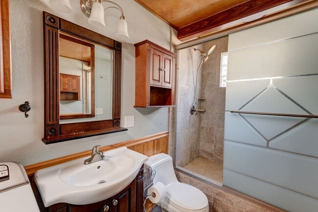 Building Photo - Spacious 4-Bedroom Home with Fireplace, Fenced Yard, and 2-Car Garage