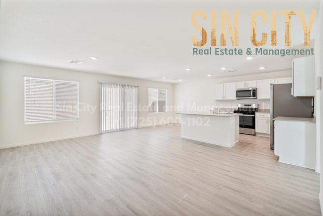 Building Photo - "Charming 4-Bed Oasis on La Cura Avenue: Spacious Living with 2.5 Baths in Vibrant Las Vegas!"