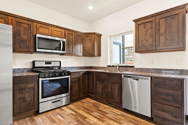 Building Photo - 2-Story Urban Triplex at a modern communit...