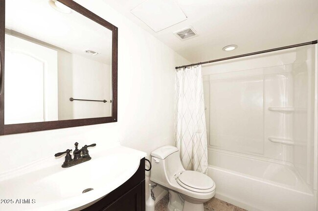 Building Photo - 7910 E Camelback Rd