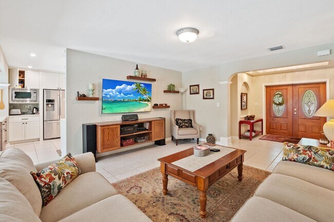 Building Photo - Stunning 4BR/3BA Pool Home with Outdoor Oa...