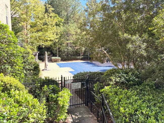 Building Photo - Modern 1-Bed Townhome Near Perimeter Mall — Gated, Bright, and Convenient!