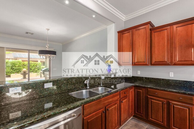 Building Photo - 7150 W Heritage Way