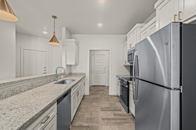 Building Photo - **MOVE IN SPECIAL** Stunning Townhomes in Frenship ISD!