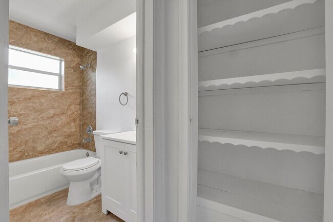 Building Photo - Sunrise Gem: Updated 2-Bed, 2-Bath with Garage Parking