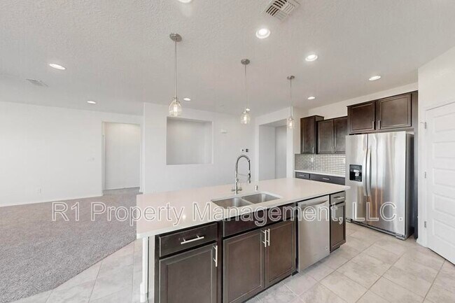 Building Photo - 6405 Kings Cyn Cv NE