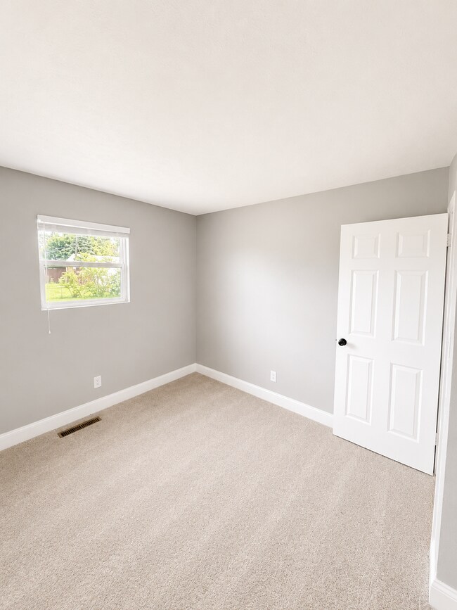 Building Photo - Stylishly Renovated 3-Bedroom Home with Finished Basement & Spacious Fenced Yard